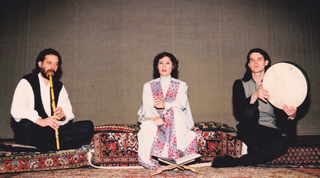Parissa with Hossein Omoumi and Saam on patterned rug — ney, frame drum, and book stand; Tale of Love performances